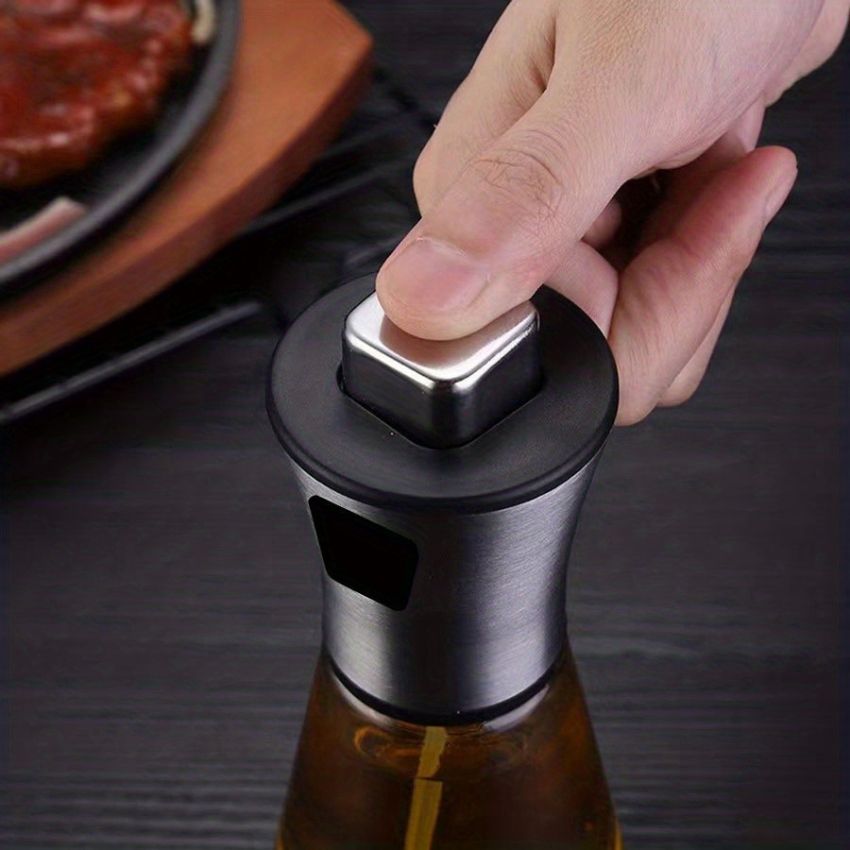 Stainless Steel & Glass Oil Spray Bottle 200ML– BPA-Free, Pressurized Sprayer for Cooking, Grilling & BBQ – Olive Oil Dispenser, Sleek Triangular Design – Eid Gift – Large Capacity