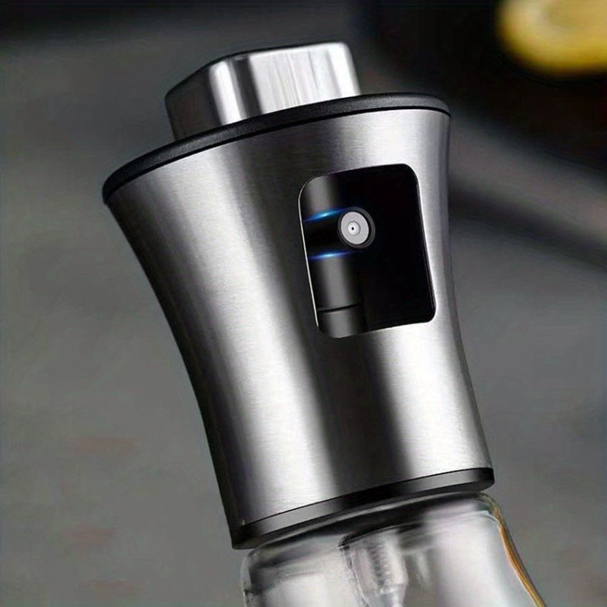 Stainless Steel & Glass Oil Spray Bottle 200ML– BPA-Free, Pressurized Sprayer for Cooking, Grilling & BBQ – Olive Oil Dispenser, Sleek Triangular Design – Eid Gift – Large Capacity