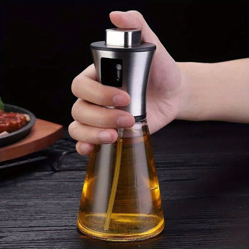Stainless Steel & Glass Oil Spray Bottle 200ML– BPA-Free, Pressurized Sprayer for Cooking, Grilling & BBQ – Olive Oil Dispenser, Sleek Triangular Design – Eid Gift – Large Capacity