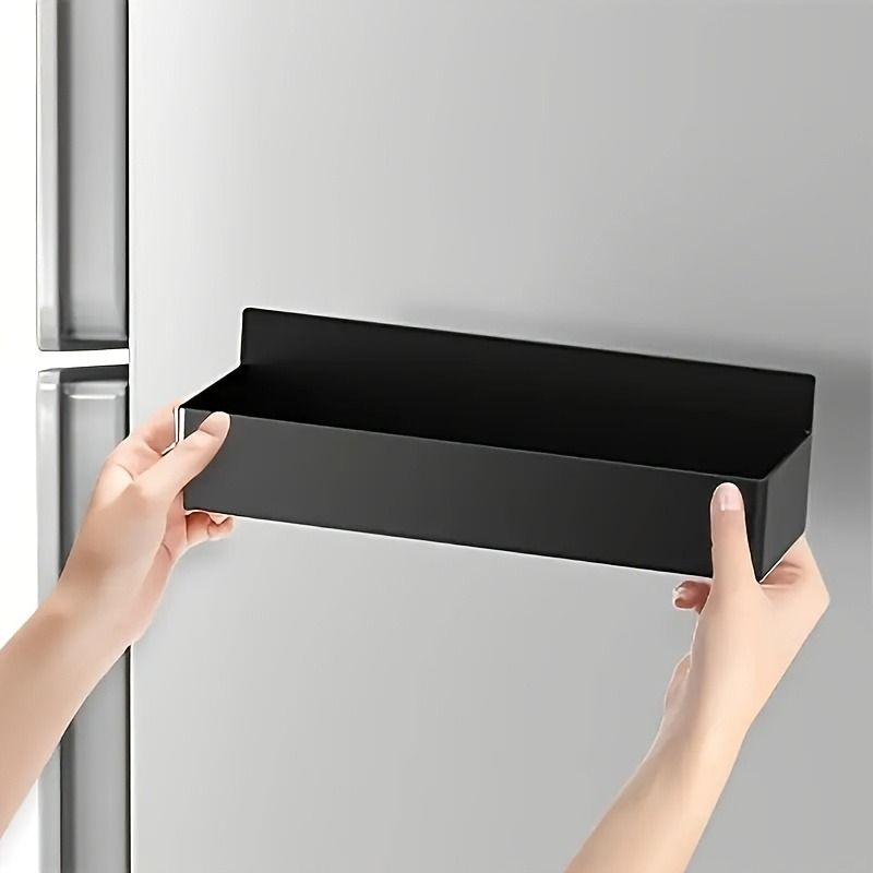 Magnetic fridge storage baskets holding spices and condiments